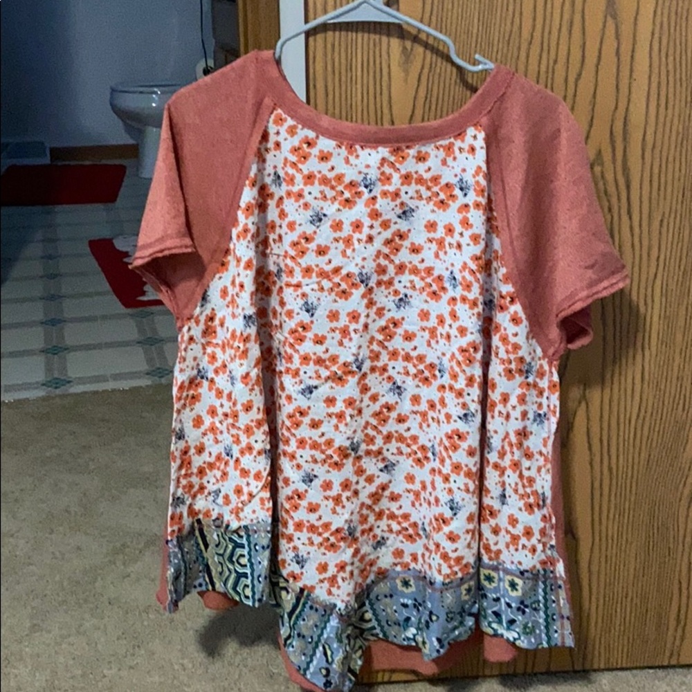 New size Large. Flowy near waist.